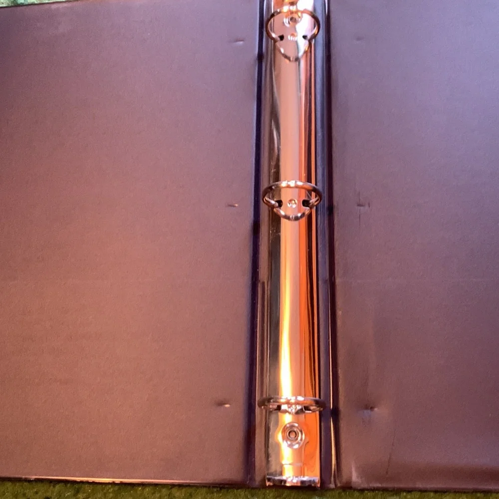 2 Penn state binders. Rough measurements in photos.